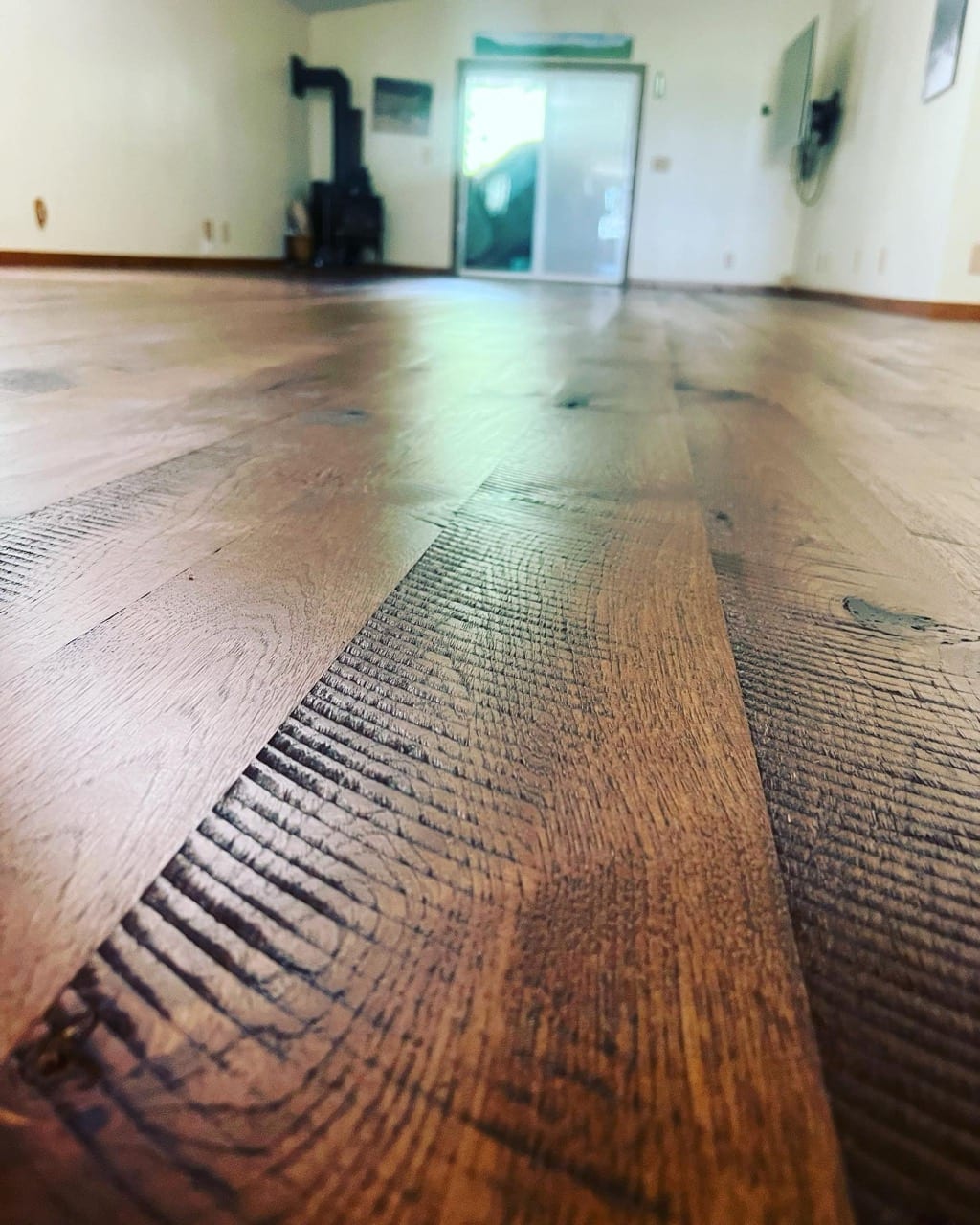 Circle-sawn skip-sawn custom hardwood floor with visible saw marks, Post Falls Idaho