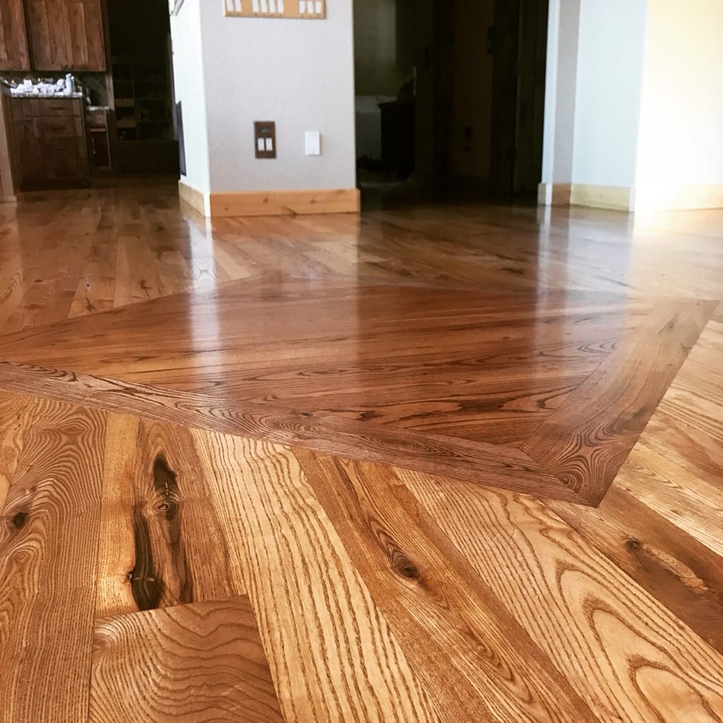Custom ash hardwood floor with inlay border detail, Rathdrum Idaho