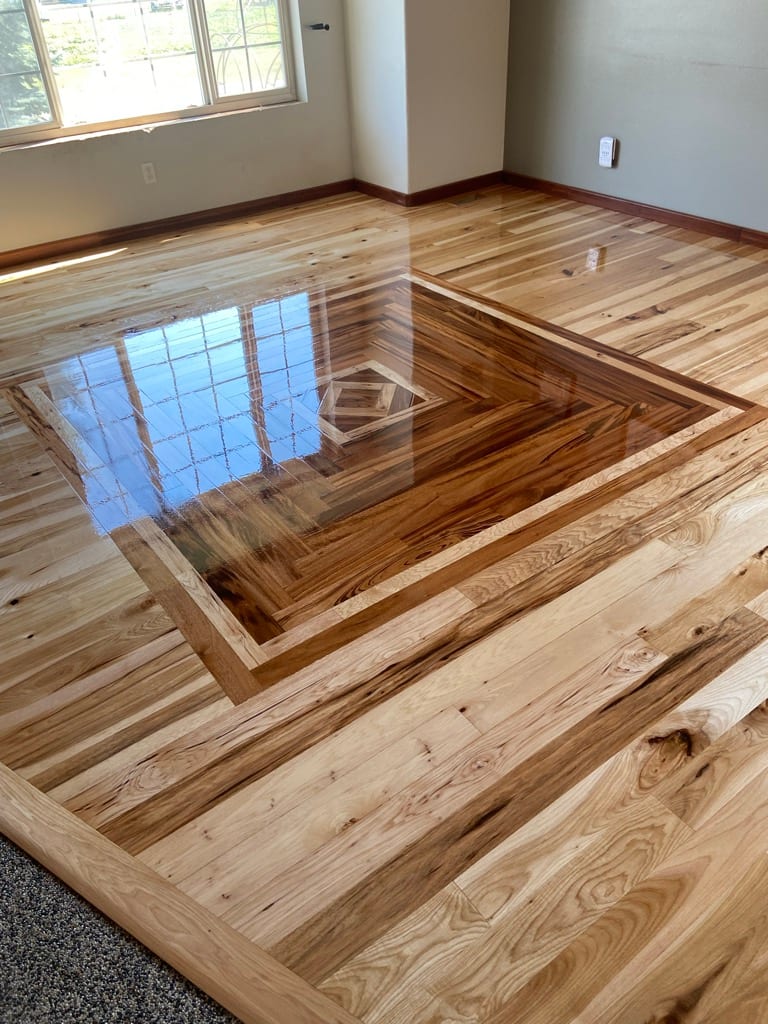 Custom diamond inlay pattern feature on hickory hardwood floor, Coeur d’Alene Idaho