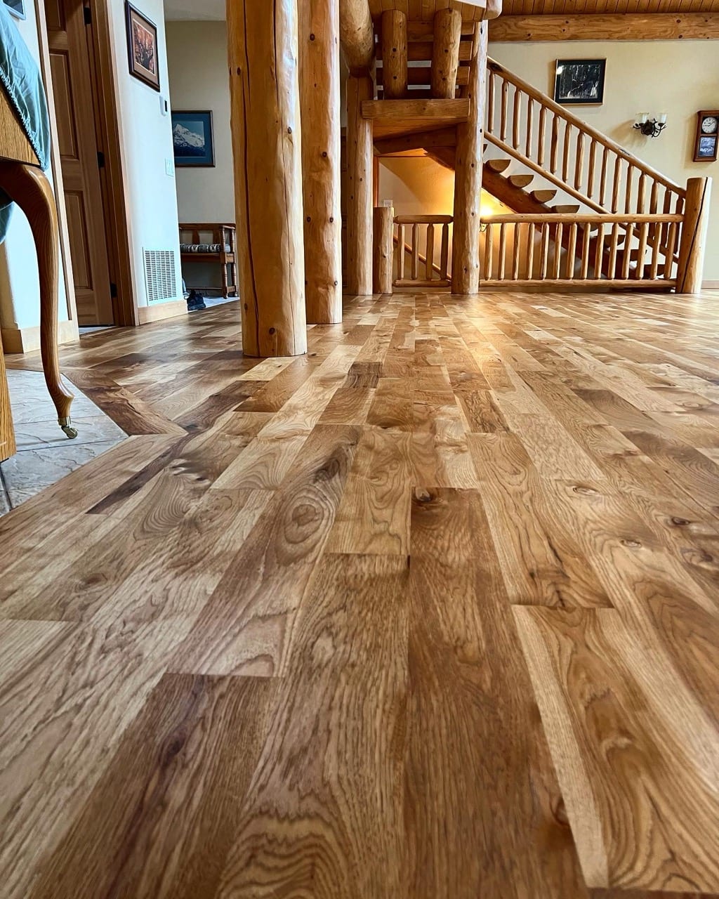 Hickory hardwood floor installed in North Idaho log cabin home