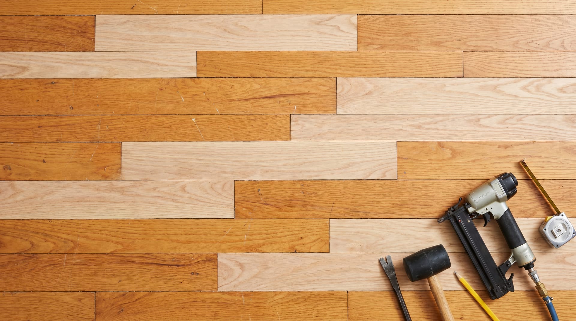 Hardwood floor board replacement repair in progress